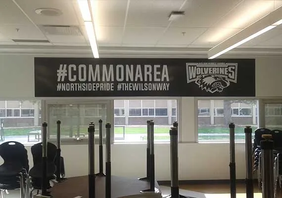 Printed banner decal above a commons area