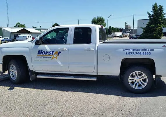 Logo and lettering on a pickup truck door